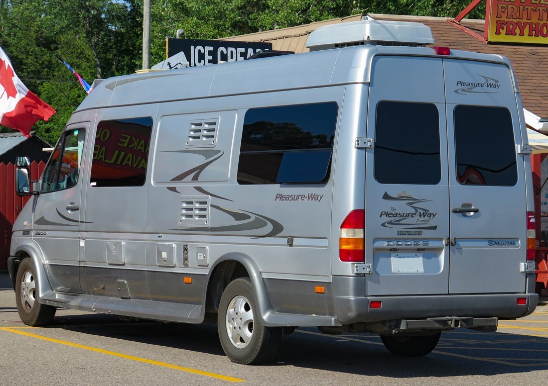 2006 Pleasure-Way Pleateau-TS 20th Anniversary on Dodge Sprinter 2500 in Anniversary Silver & Grey Two-Tone, Rear Left, 07-29-2023.jpg, illustrative rental photo
