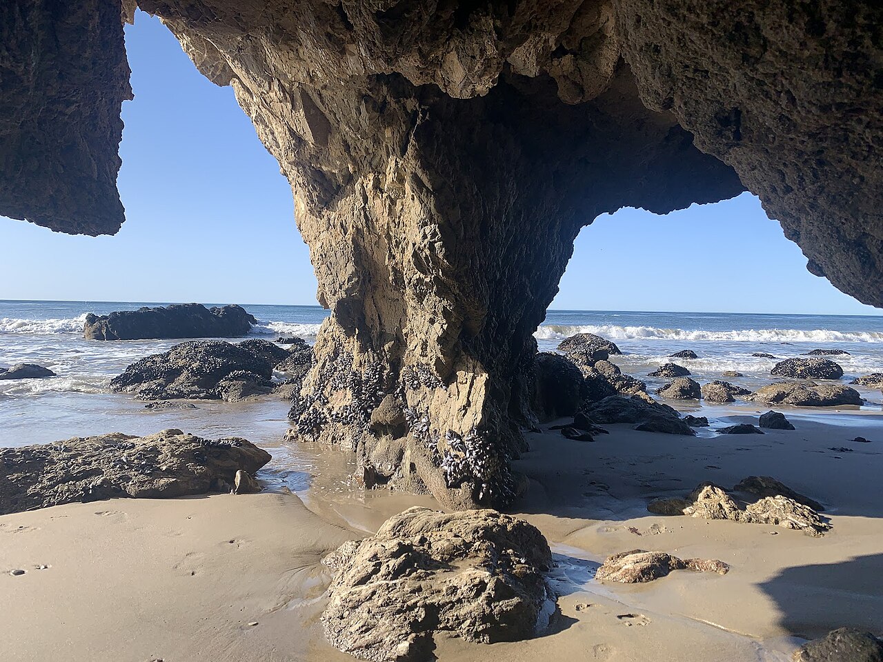 Rock formations at Playa San Juan Leighton, Malibu, California, illustrative activity photo