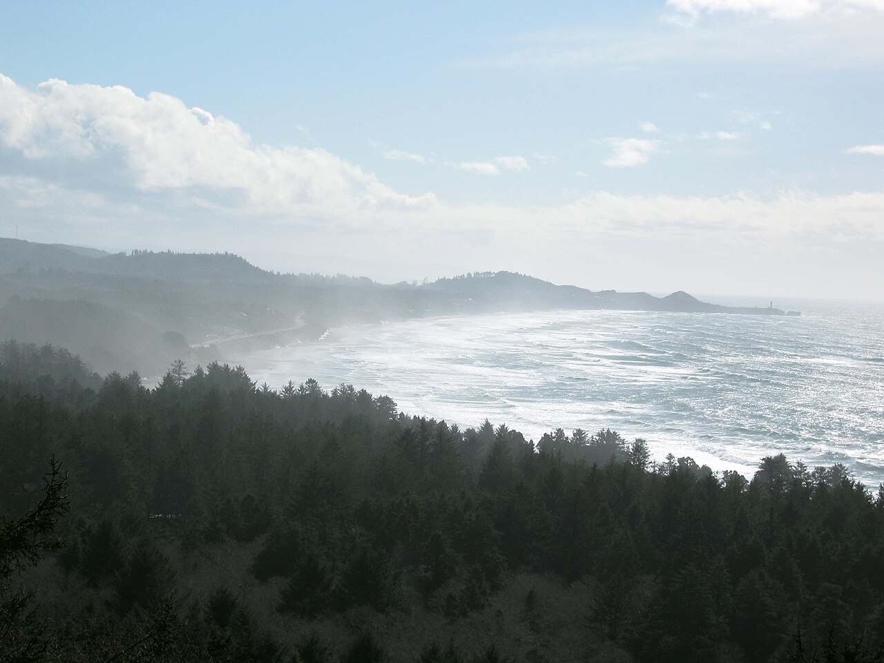 Foggy view north of Newport, Oregon and the Yaquina Lighthouse in 2009, illustrative activity photo