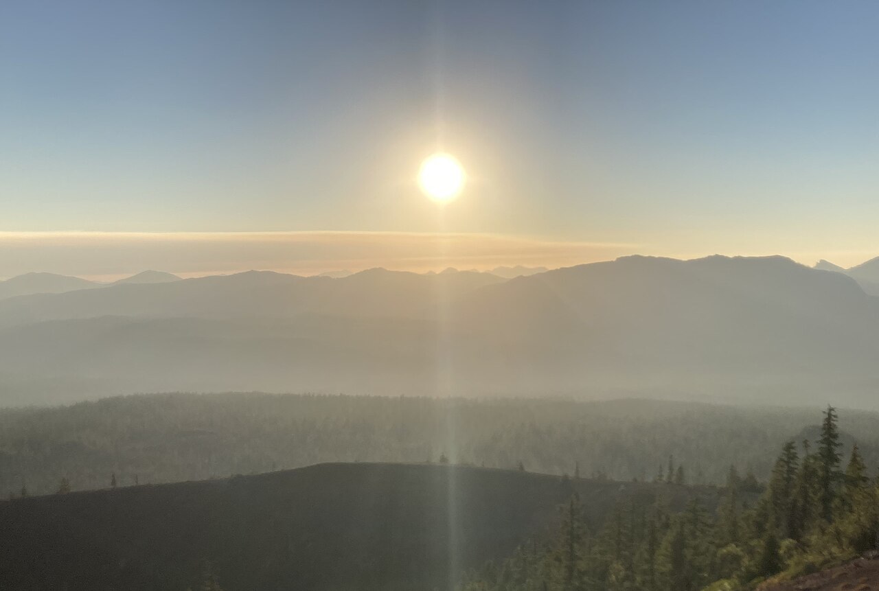 Sun rises over Willamette National Forest as seen from Sand Mountain Lookout, illustrative activity photo